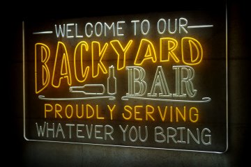 LX1043 Your Names Welcome Backyard Bar To Our Proudly Serving Whatever You Bring